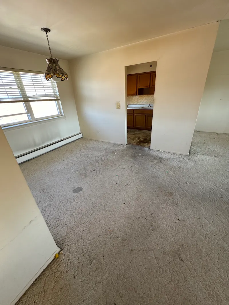 A completely empty room in a Hoboken, New Jersey apartment after JunkDoctors hauled away boxes and clutter.