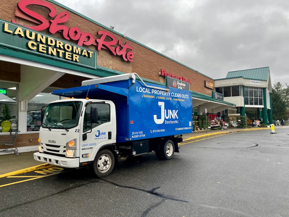 A Junk Doctors NJ 25-cubic-yard truck on-site for a full-service retail store cleanout in North NJ.