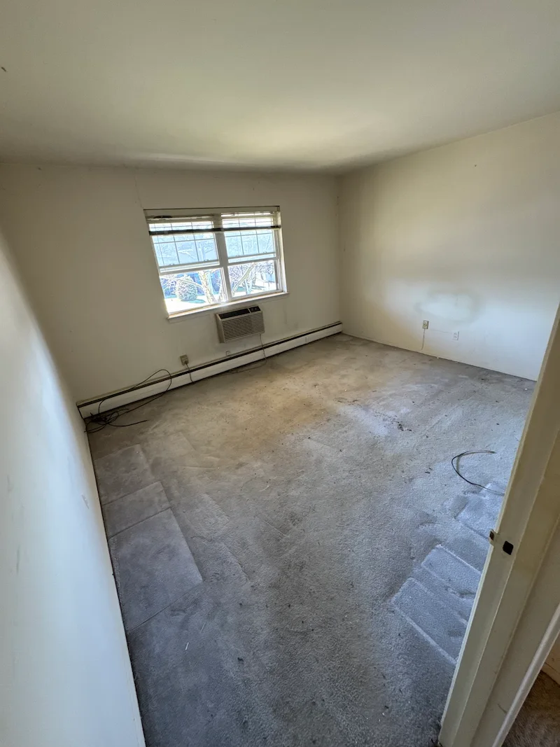 A compassionate hoarding cleanup service completed by JunkDoctors in Rockaway, Morris County, NJ showing a cleared and safe room.