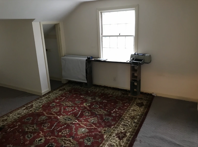 The same room from the previous image, now completely empty and swept clean after a last-minute emergency junk removal service in NJ.