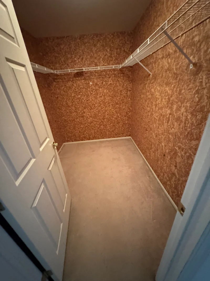 The same walk-in closet, now completely empty and swept clean by JunkDoctors NJ, ready for property listing or new tenants.