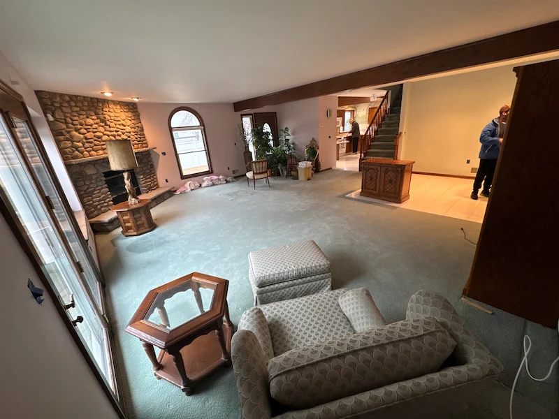 Large residential living room with heavy furniture and decor before a professional estate cleanout by Junk Doctors NJ.