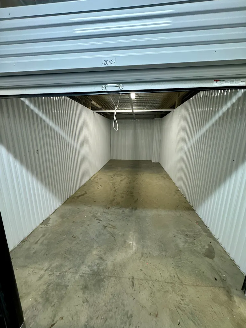 After shot of the same storage unit, completely cleared and swept clean by the Junk Doctors professional hauling team.