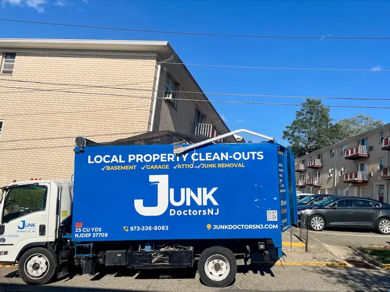 A large 25-cubic-yard Junk Doctors NJ truck parked and ready to assist with a professional storage unit cleanout in North NJ.