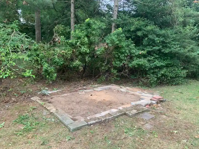 After photo: A clear, clean backyard space in New Jersey after the Junk Doctors crew fully dismantled and hauled away an old wooden shed.
