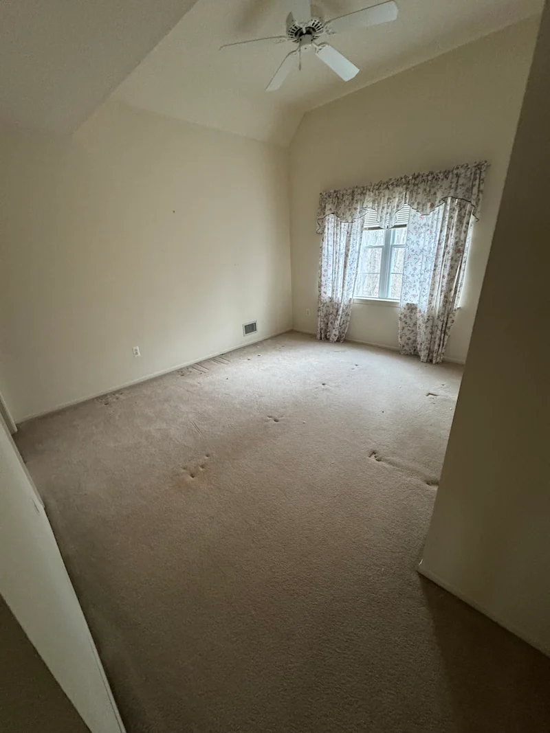 Cleared and swept bedroom after a JunkDoctors estate cleanout in New Jersey.