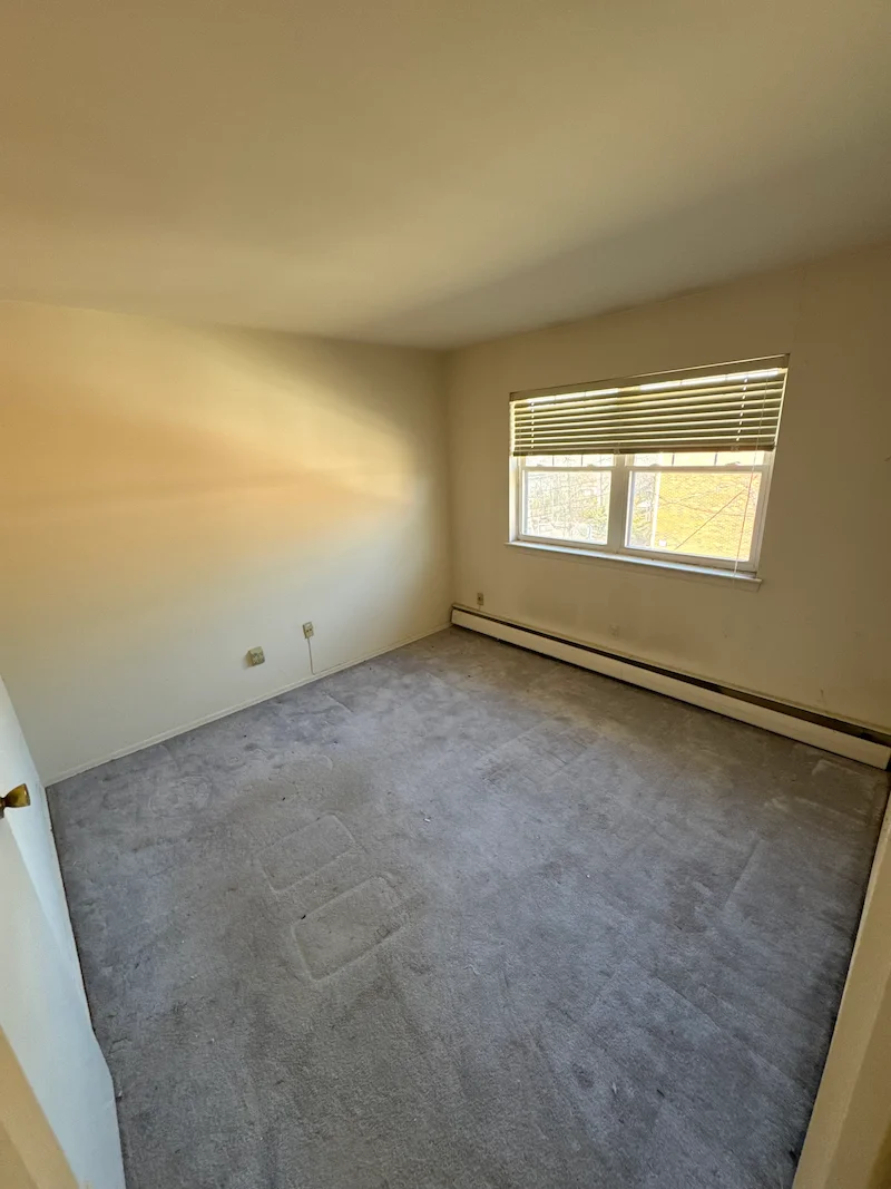 Clean living room after an extreme hoarding cleanout in New Jersey